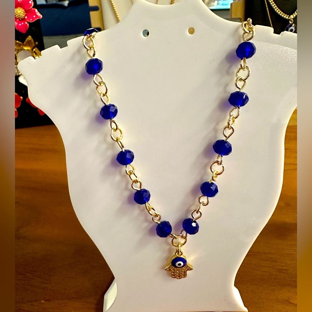 Blue crystal hamsa necklace